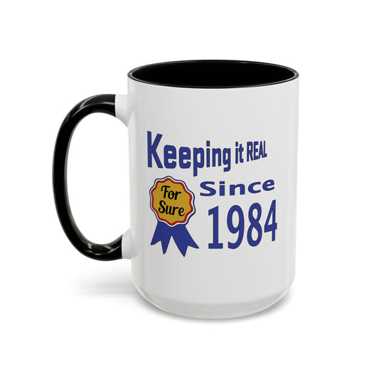 Keepin it Real Since 1984 Coffee Mug - Double Sided Print, Black Accent White Ceramic, 11oz by TheGlassyLass.com